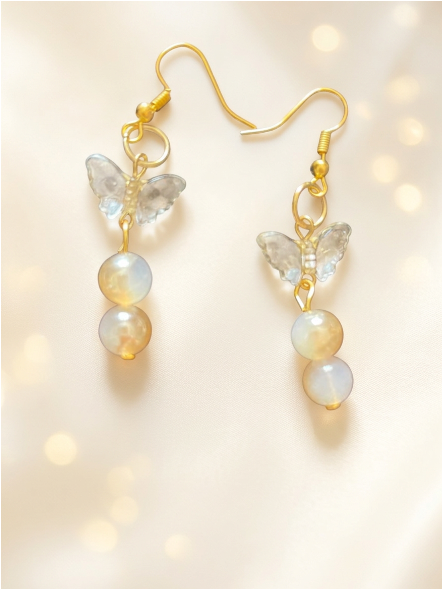 Boucles d’oreilles papillons cristal plaqué or