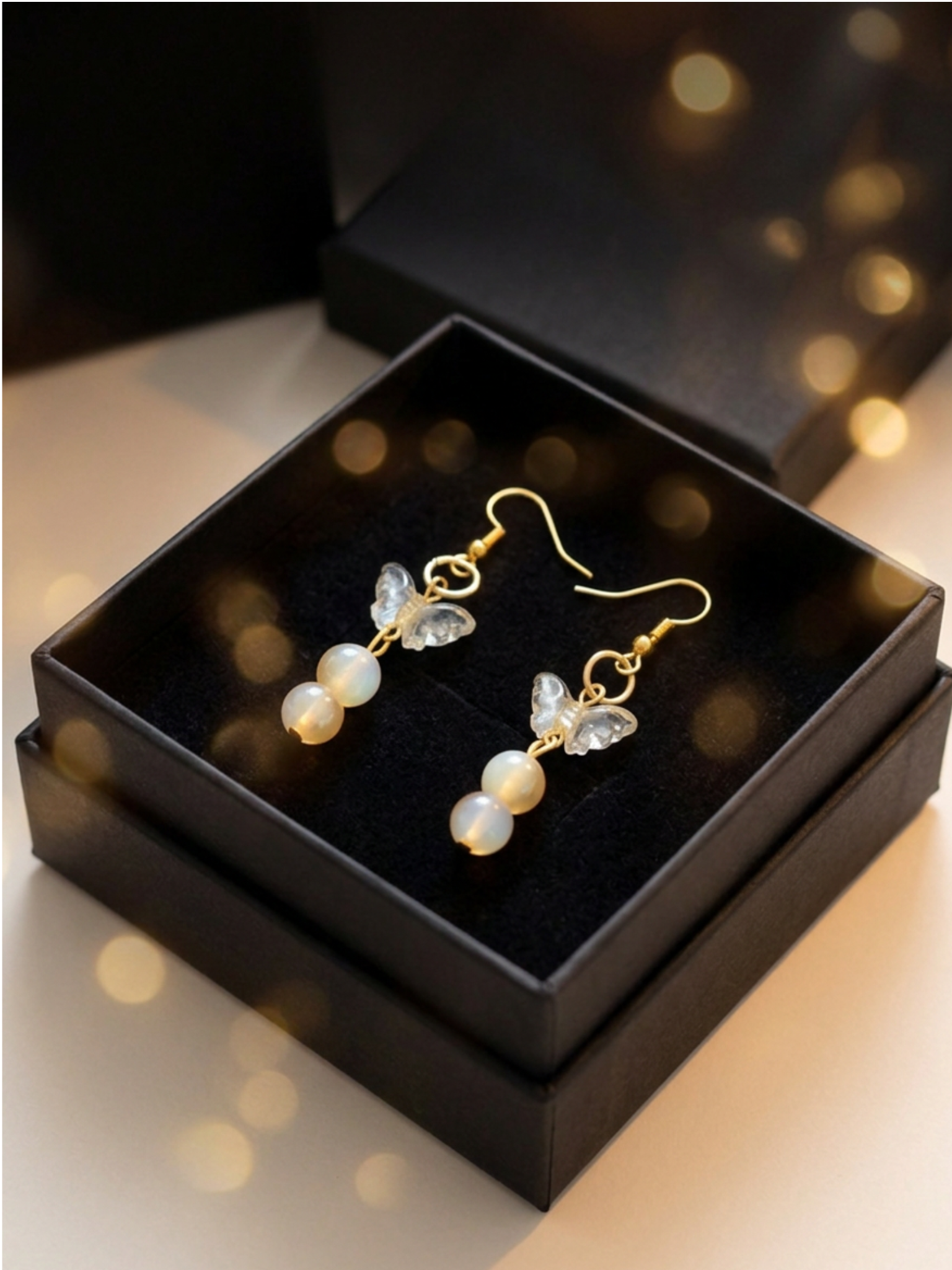 Boucles d’oreilles papillons cristal plaqué or