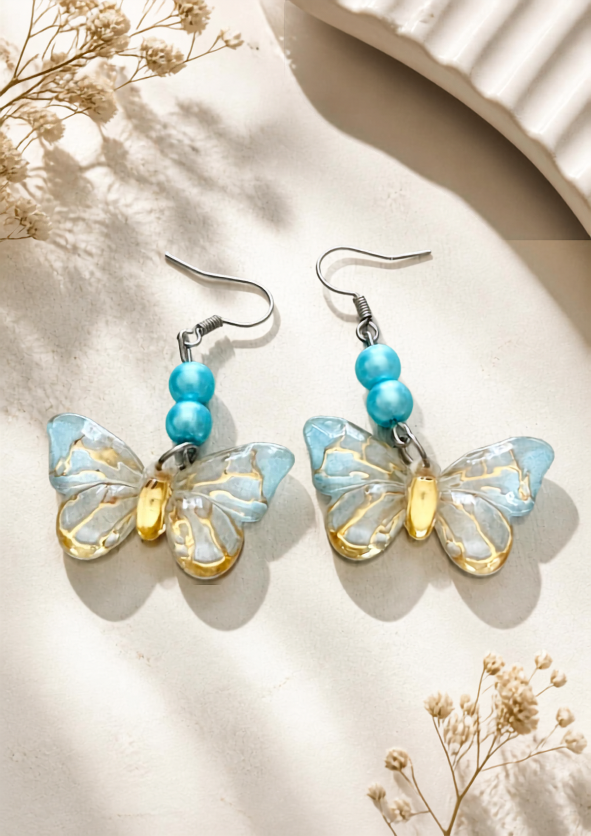 Boucles d’oreilles papillons en plaqué argent