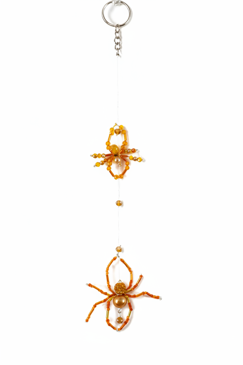 Attrape-soleil double araignée orange fond blanc