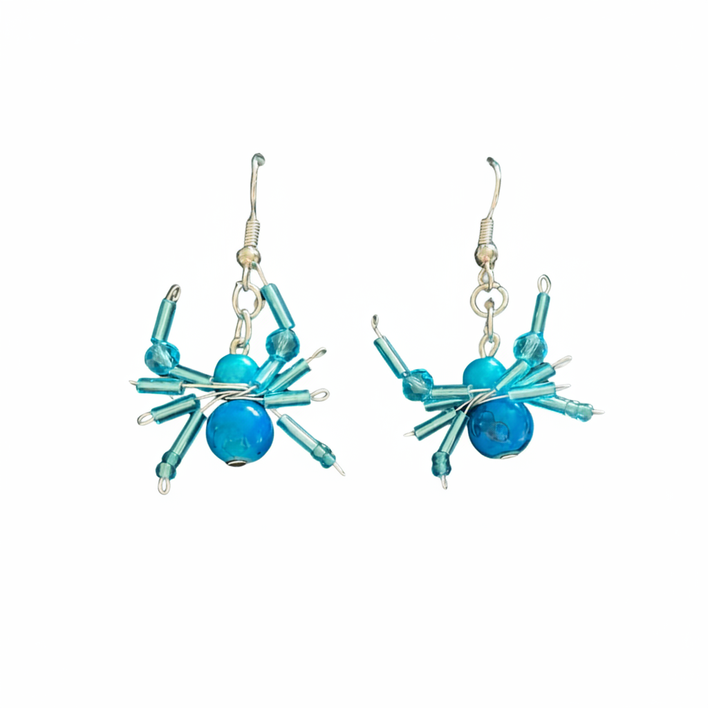 Boucles d'oreilles araignée fond blanc