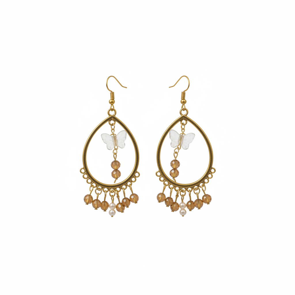 Boucles d'oreilles bohème dorées fond blanc