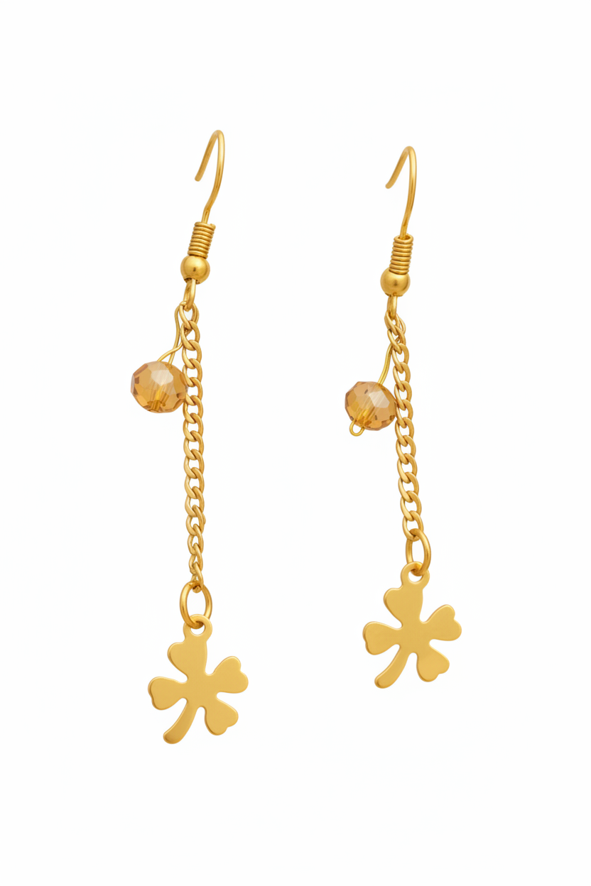 Boucles trèfle doré cristal ambré chaîne fond blanc